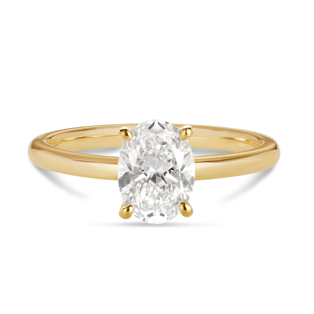 18ct yellow gold oval cut lab grown (cultured) diamond engagement ring with a petite 4 claw setting. This beautiful engagement ring can be made with lab grown or natural diamonds. Custom made engagement rings sunshine coast, Buderim. Australian made engagement rings