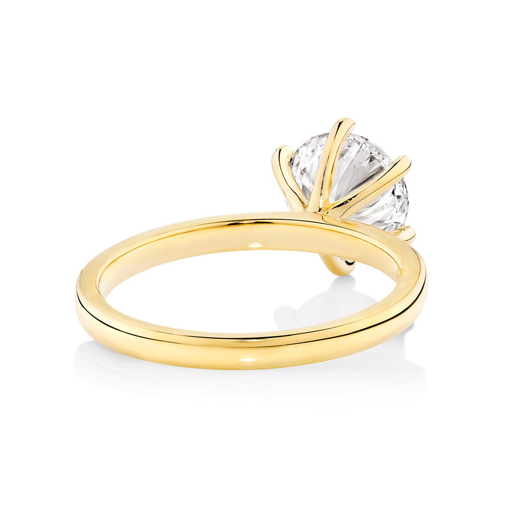 yellow gold 2ct brilliant round diamond engagement ring set in a modern 6 claw setting. This beautiful engagement ring can be made with lab grown or natural diamonds. Custom made engagement rings sunshine coast, Buderim