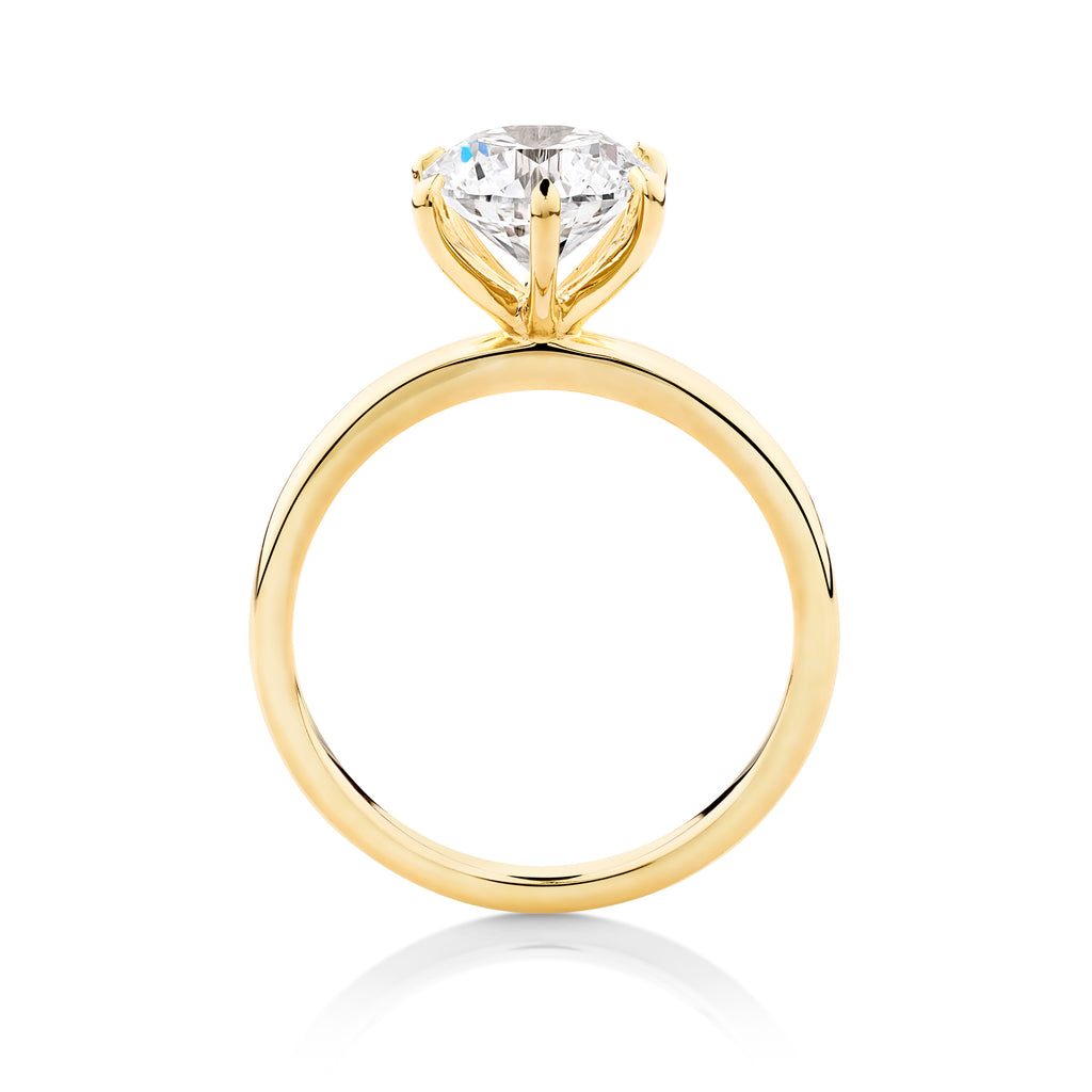 yellow gold 2ct brilliant round diamond engagement ring set in a modern 6 claw setting. This beautiful engagement ring can be made with lab grown or natural diamonds. Custom made engagement rings sunshine coast, Buderim