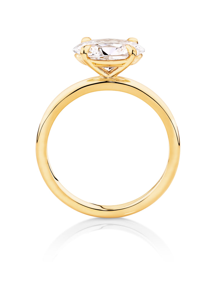 yellow gold oval cut diamond engagement ring set in an east to west setting. This ring  can be made with lab grown or natural diamonds. Custom made engagement rings sunshine coast, Buderim