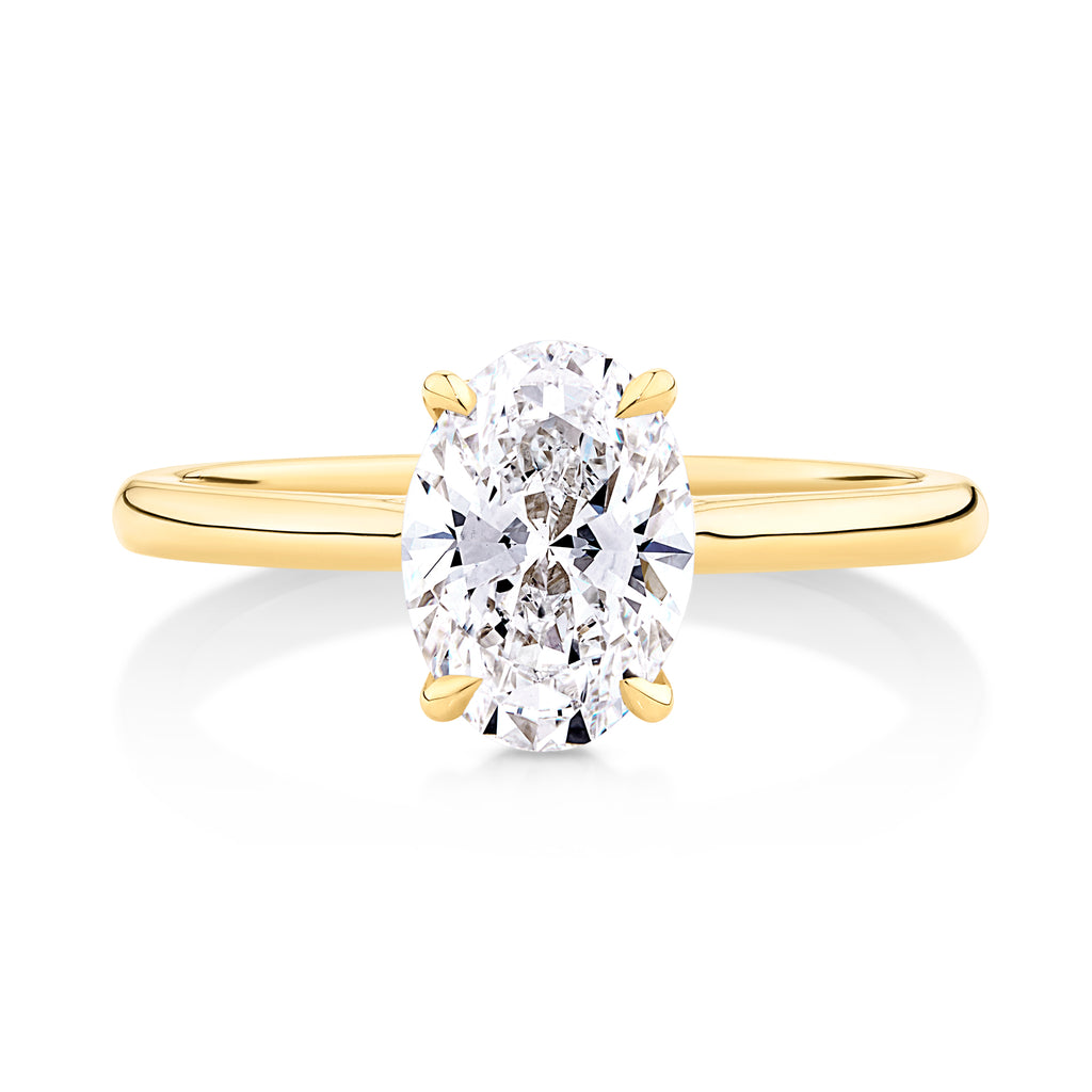 yellow gold oval engagement ring from sunshine coast jeweller