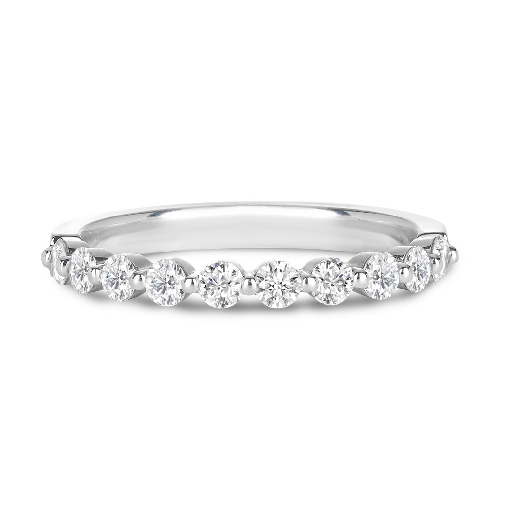White gold bezel set wedding ring featuring a total of 10 mined round brilliant diamonds with a total of .60ct and crafted in 9ct white gold. Sunshine Coast jewellers for your custom made wedding bands. 