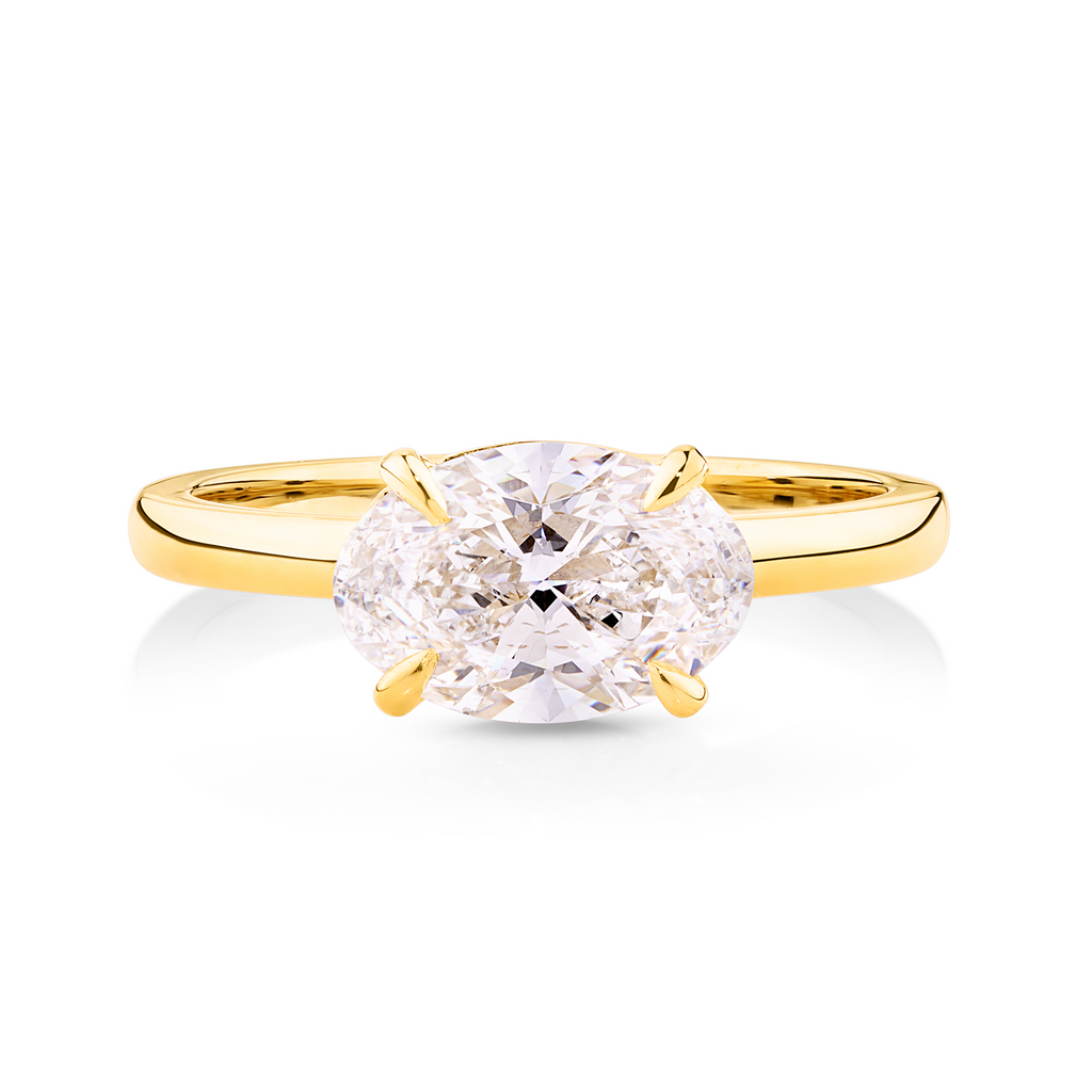 yellow gold oval cut diamond engagement ring set in an east to west setting. This ring can be made with lab grown or natural diamonds. Custom made engagement rings sunshine coast, Buderim
