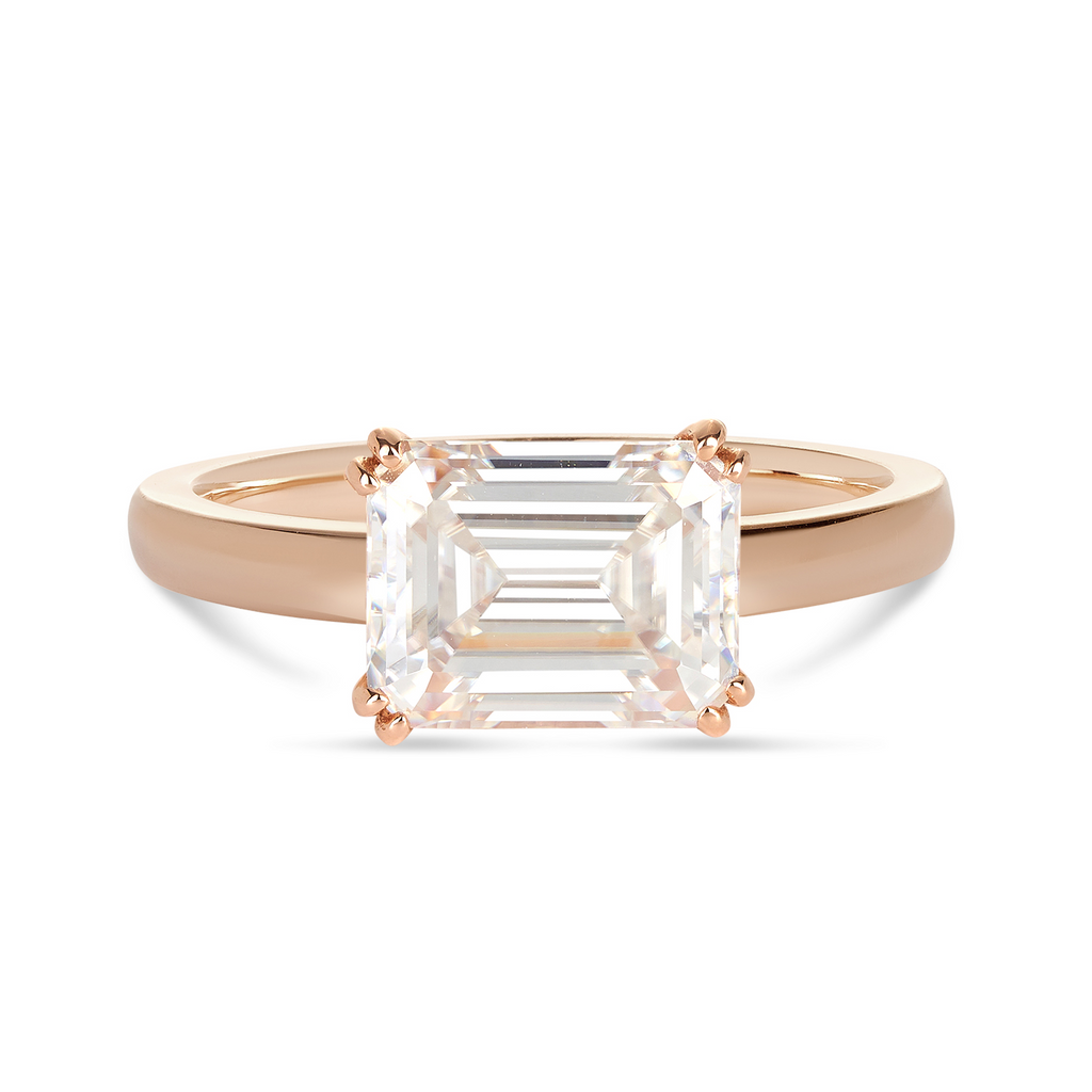 rose gold engagement ring with east to west diamond set with emerald cut diamond. Sunshine Coast jeweller, Morgan & Co, create every piece custom made