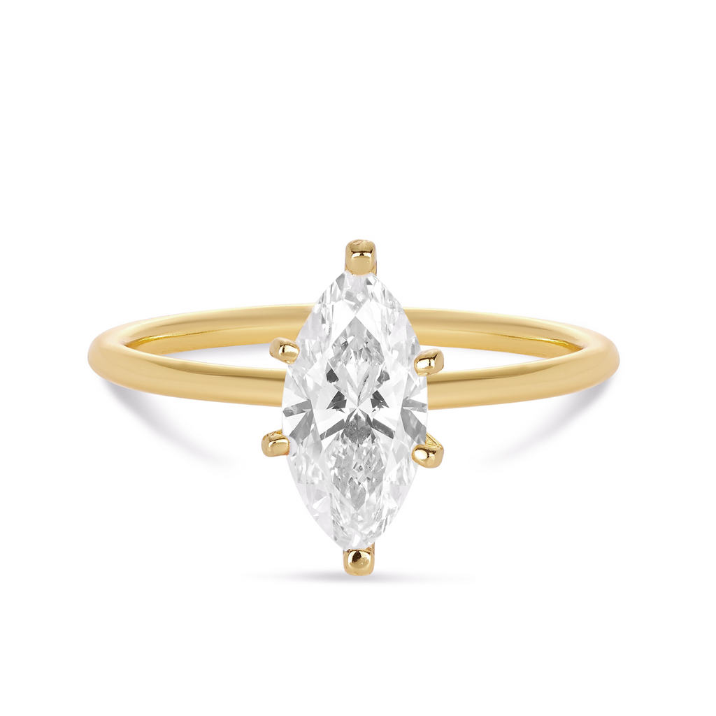 yellow gold engagement ring with marquise cut diamond in delicate band and setting. Sunshine Coast jewellery beautiful engagement rings 