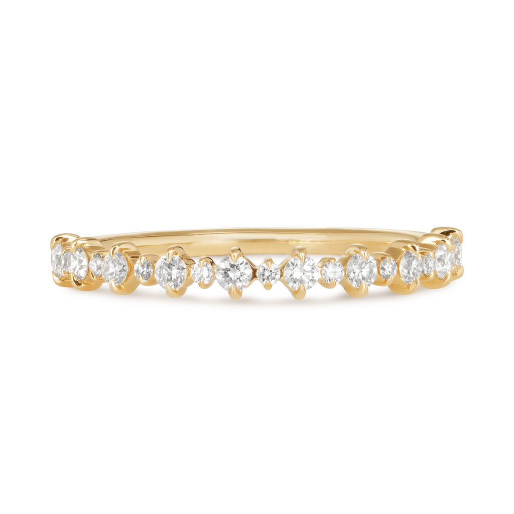 14ct Yellow Gold wedding band featuring alternating large and small&nbsp;cultured brilliant round diamonds in a delicate off set claw setting. <p>This wedding band&nbsp;contains a total diamond weight of .18ct natural diamonds and is set in 9ct yellow gold. A beautiful and unique twist to a classic wedding band. Sunshien Coast wedding bands at Buderim Jeweller