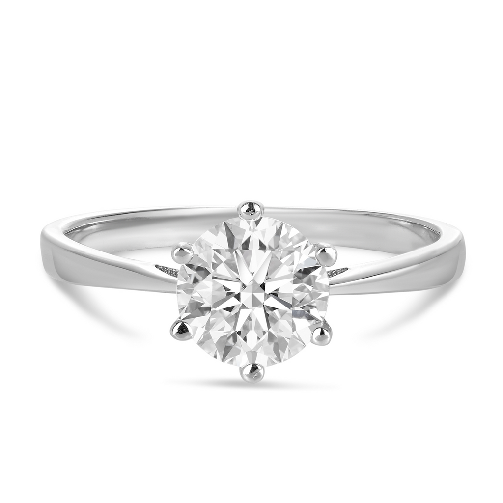 white gold engagement ring featuring a round diamond in a 6 claw setting with tapered band. Beautiful engagement rings Sunshine Coast