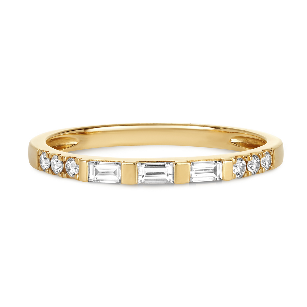 modern wedding band featuring baguette cut diamonds and round diamonds in a unique setting. wedding rings sunshine coast 