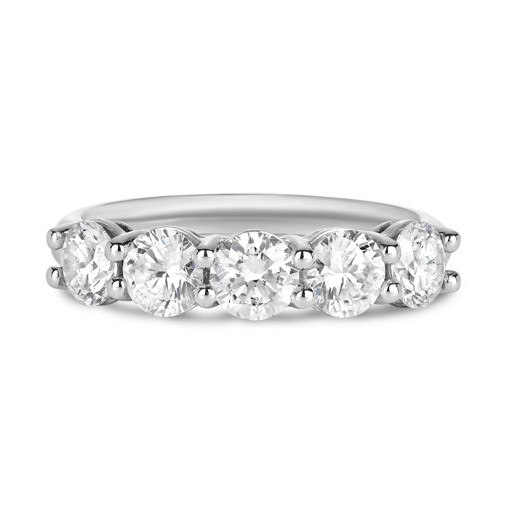 white gold wedding band featuring large round diamonds in a shared claw setting. Statement wedding band sunshine coast jeweller