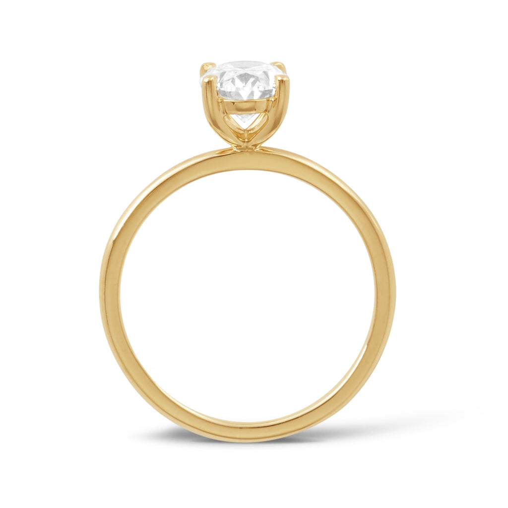 Side view of 18ct yellow gold oval cut lab grown (cultured) diamond engagement ring with a petite 4 claw setting. This beautiful engagement ring can be made with lab grown or natural diamonds. Custom made engagement rings sunshine coast, Buderim. Australian made engagement rings