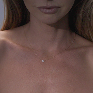 video of necklace on model. 18ct Yellow Gold Delicate Necklace with a Four Claw Set .50ct Brilliant Round Cultured Diamond. Sunshine Coast Jewellery Store custom made pieces