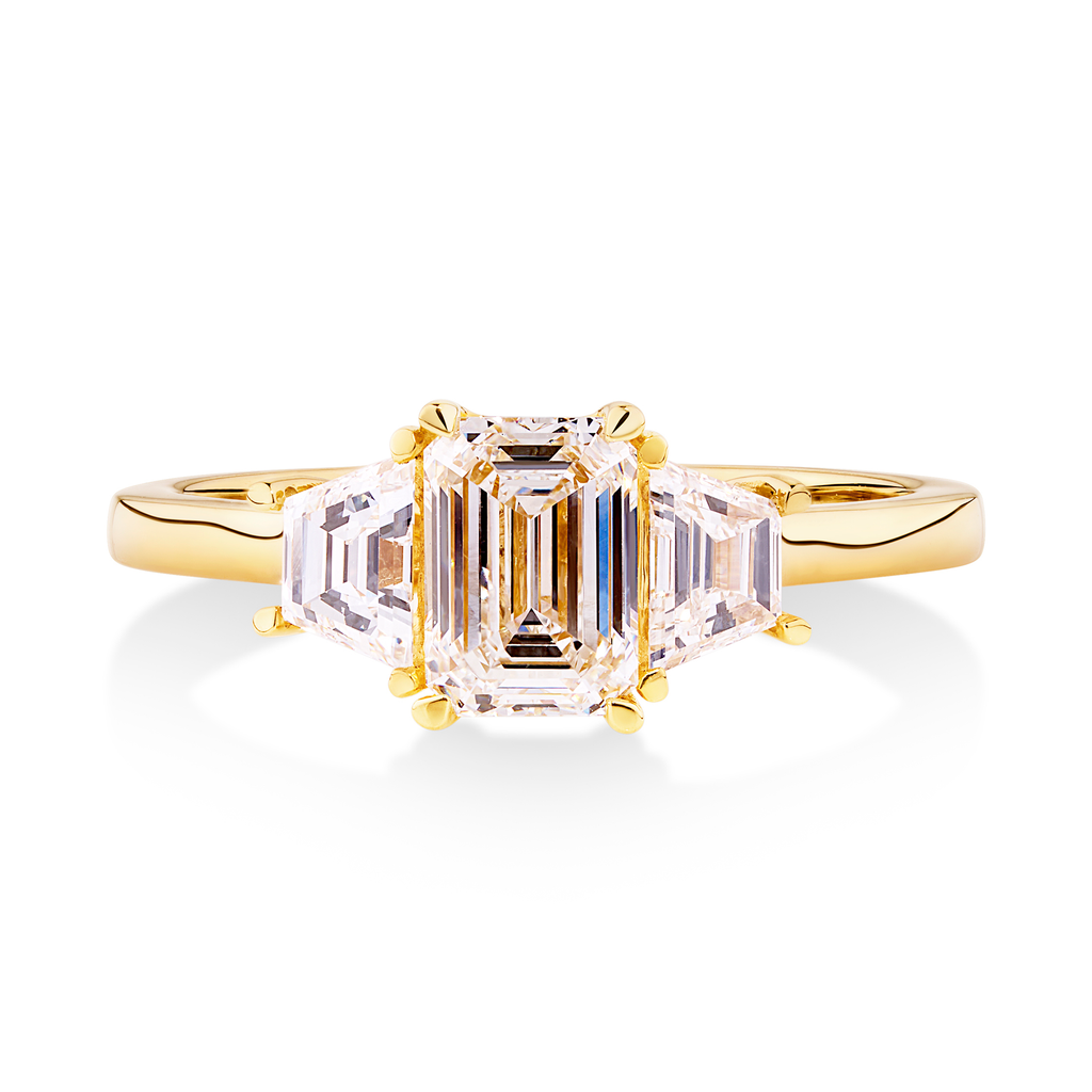 trilogy emerald cut diamond engagement ring in yellow gold 